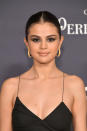 <p>Gomez sported slicked back hair, dramatic eye makeup and hoop earrings at the third annual <em>InStyle</em> Awards on Oct. 23.</p>