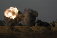 An Israeli mobile artillery unit fires a shell from southern Israel towards the Gaza Strip, in a position near the Israel-Gaza border, Tuesday, May 7, 2024. (AP Photo/Leo Correa)