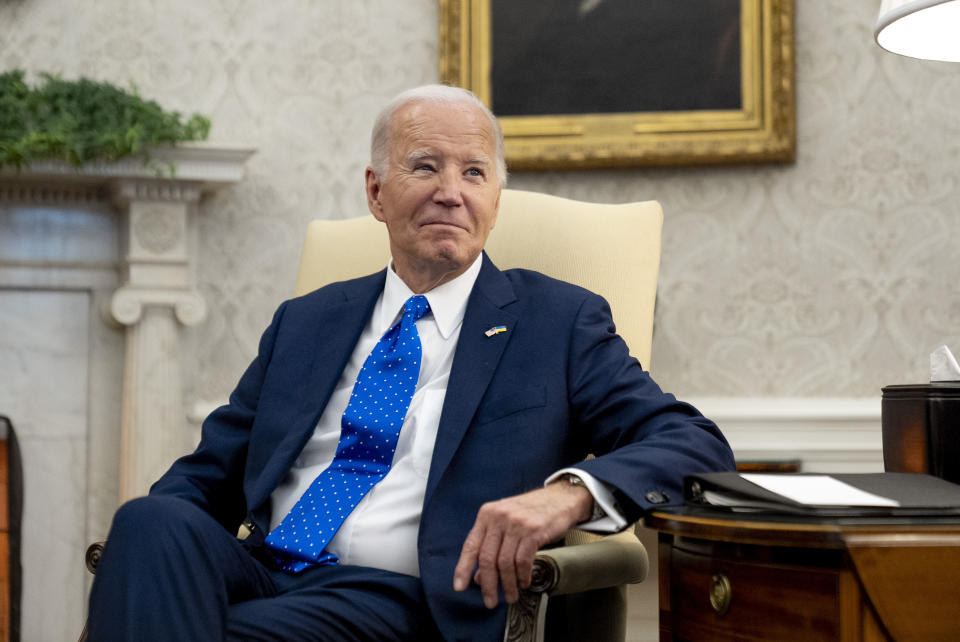 President Joe Biden meets with German Chancellor Olaf Scholz in the Oval Office of the White House, Friday, Feb. 9, 2024, in Washington. (AP Photo/Andrew Harnik)