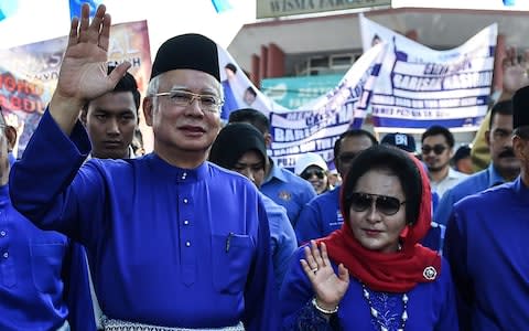 Former Malaysian Prime Minister Najib Razak and his wife Rosmah Mansor are facing a corruption probe - Credit: Mohd Rasfan/AFP