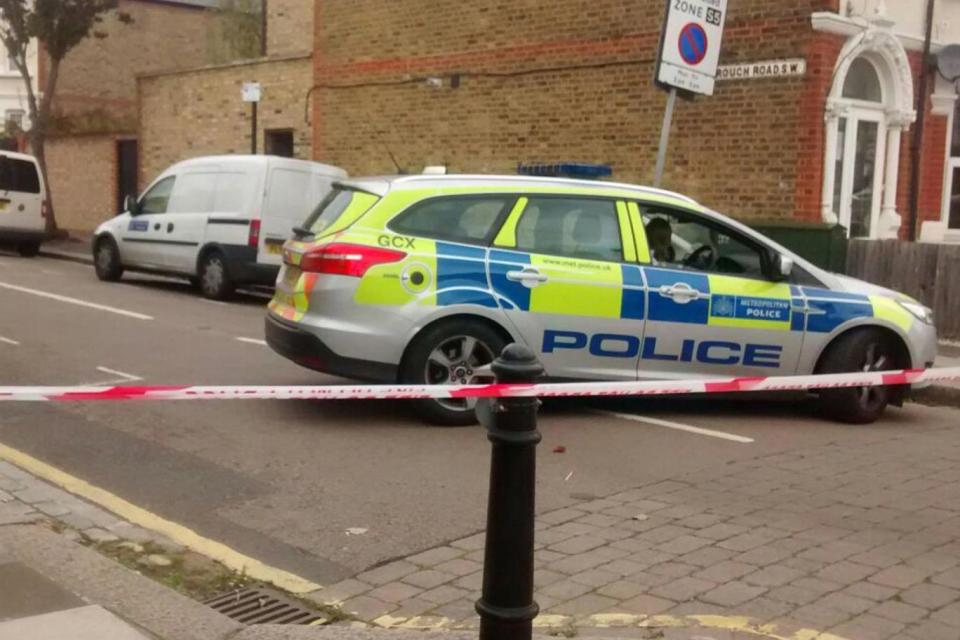 A badly charred corpse has been found in the garden of a house in Wandsworth