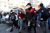 People attend a demonstration in Istanbul