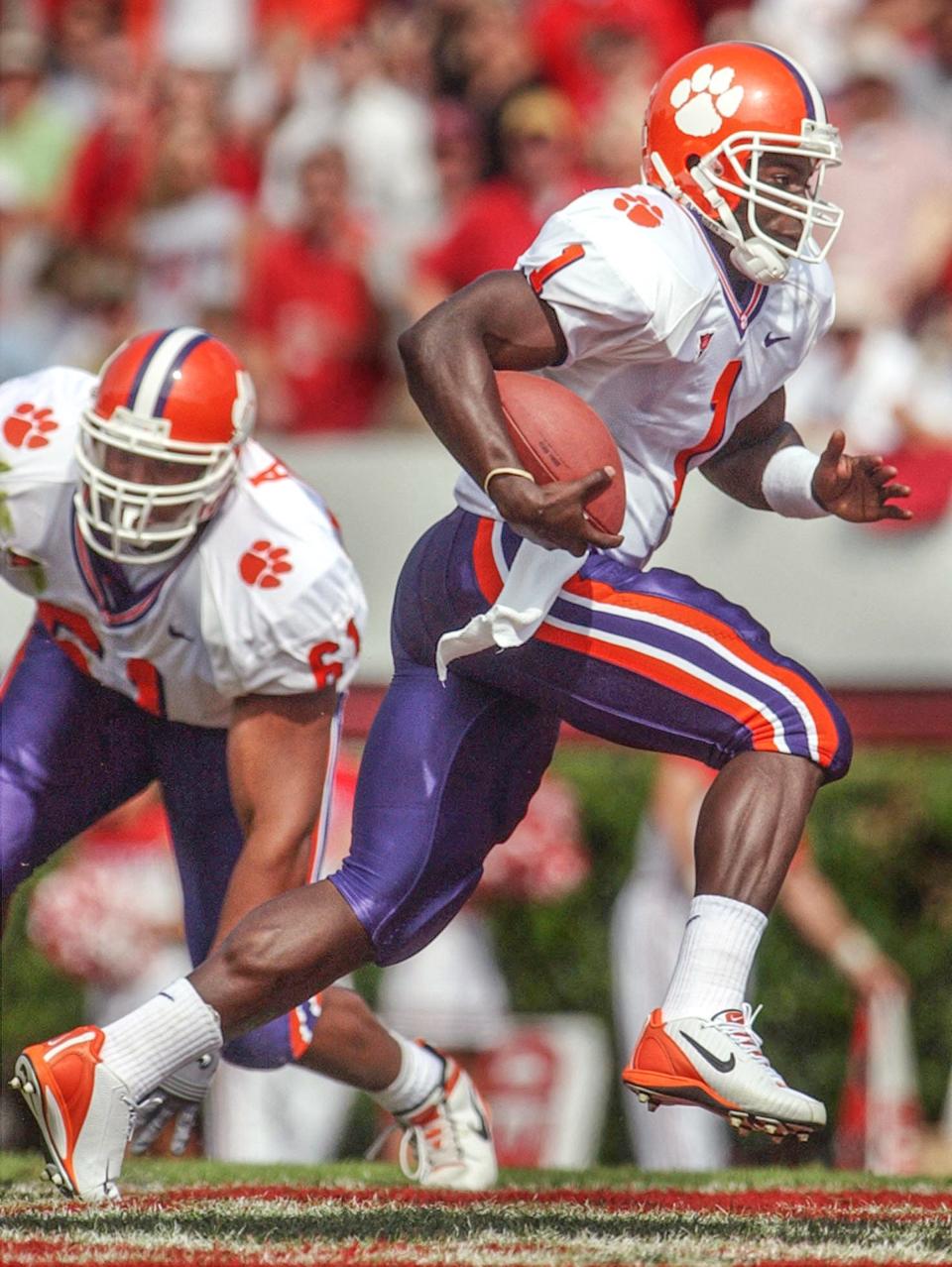 Clemson's Woody Dantzler scrambles 55 yards on Clemson's first possession to score a touchdown against N.C. State in 2001.