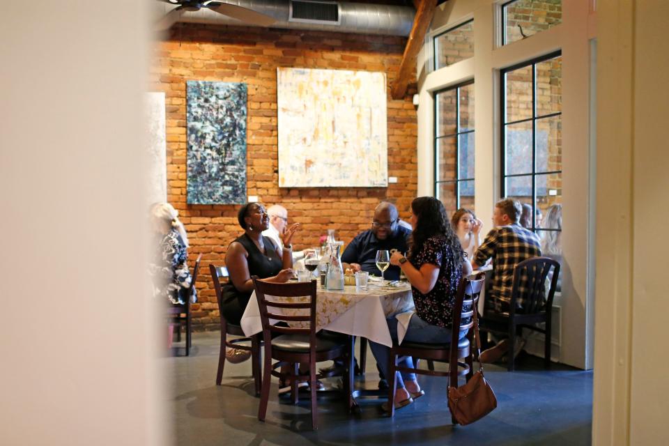 Customers enjoy dinner at The Last Resort Grill in Athens, Ga., on Thursday, Sept. 8, 2022. The iconic downtown restaurant is celebration 30 years. 