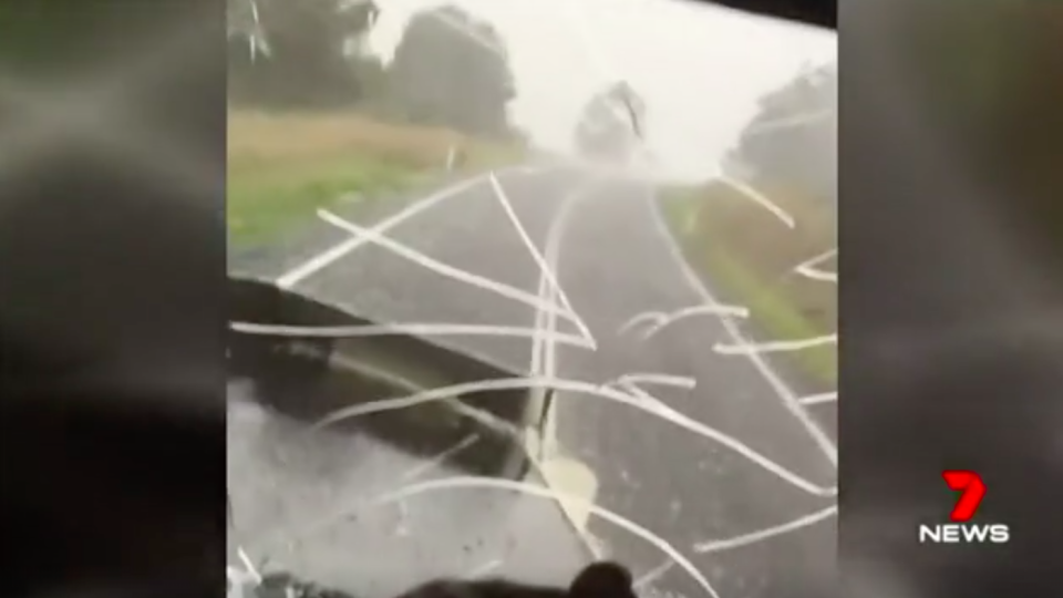 The windscreen cracks as the truckie drives into the tornado. Source: 7 News