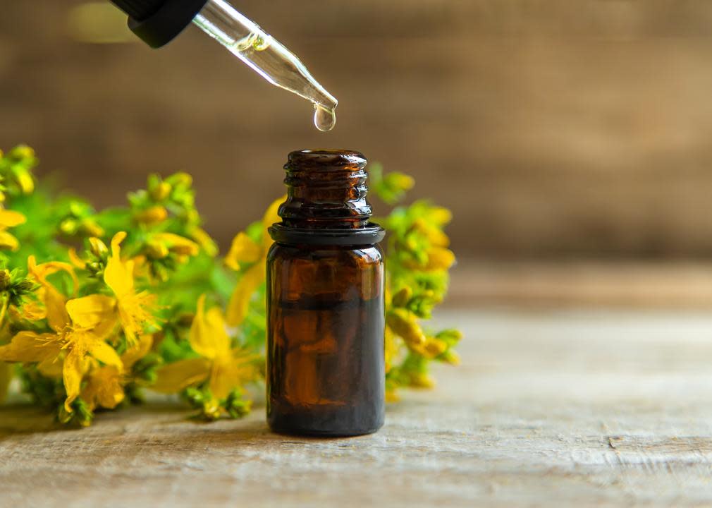 St. John's wort essential oil in a small bottle.
