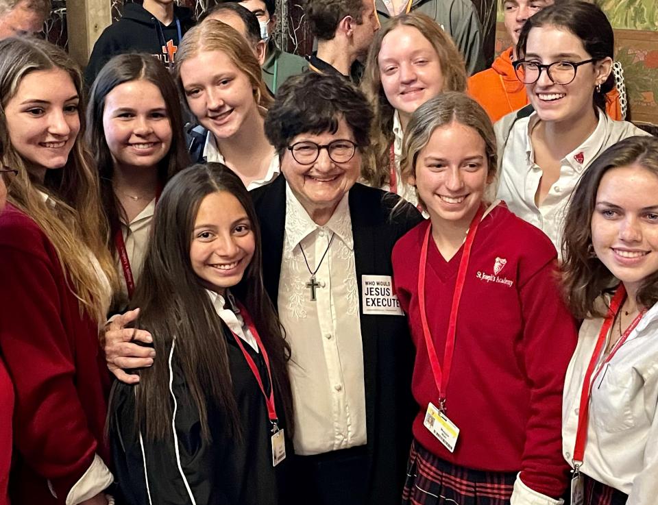 Sister Helen Prejean, a decades-long advocate to abolish the death penalty in Louisiana, is surrounded by students from St. Joseph's Academy in the Louisiana Capitol in 2022 during a press conference to support bills that would eliminate executions in the state.