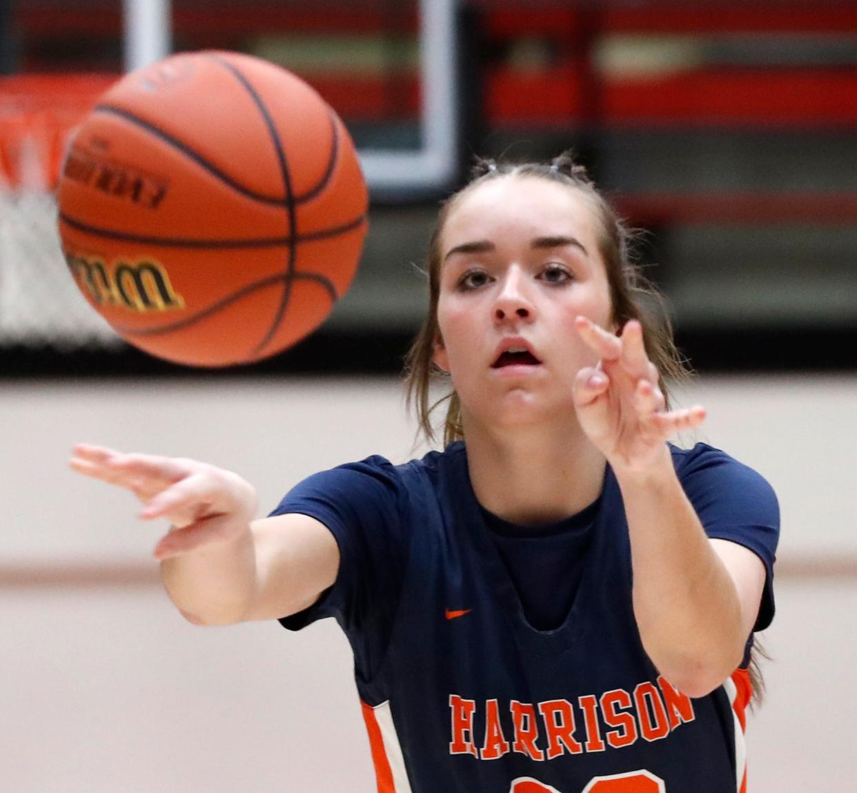 Harrison Raiders Elsie Ahnert (22) passes the ball during the IHSAA girl’s basketball sectionals championship game against the Logansport Berries, Saturday, Feb. 4, 2023, at the Lafayette Jeff High School in Lafayette, Ind. Harrison won 46-29.