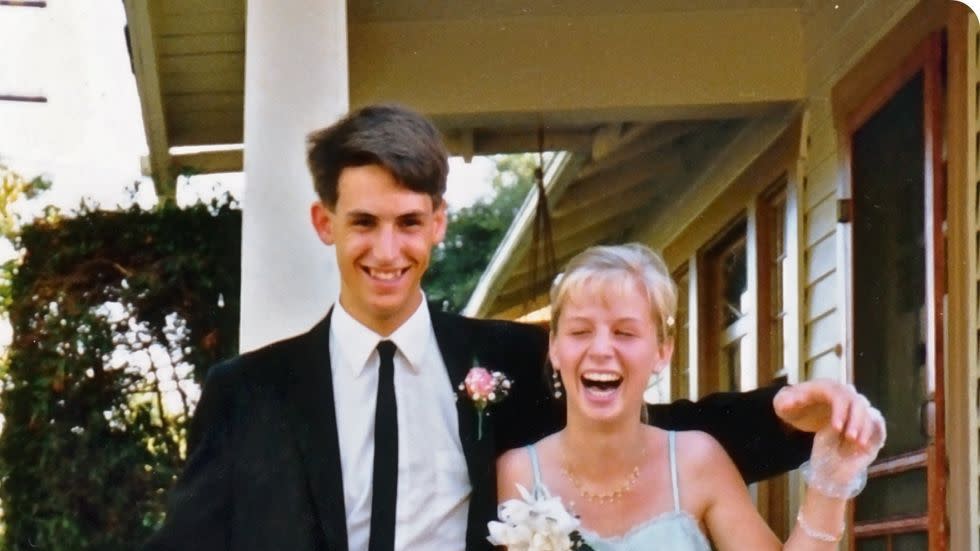 a man and woman posing for a picture