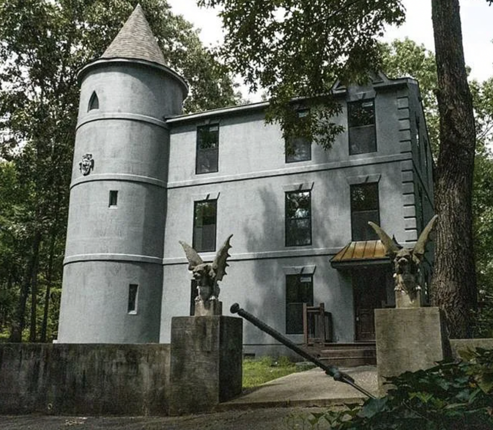 A Walhalla, SC, storybook home with a tower, gargoyles and sword in a stone carries a $525,000 asking price.