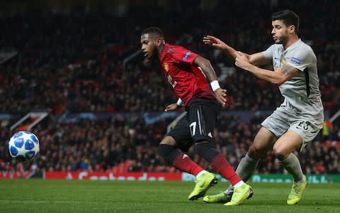 Fred (left) shields the ball - Credit: getty images