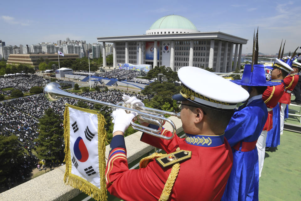 South Korean guard of honor perform during an inaugural ceremony of the new South Korean President Yoon Suk Yeol at the the National Assembly in Seoul, South Korea, Tuesday, May 10, 2022. Yoon took office as South Korea’s new president Tuesday with a vow to pursue a negotiated settlement of North Korea's threatening nuclear program and an offer of “an audacious plan” to improve Pyongyang’s economy if it abandons its nuclear weapons. (Kim Min-hee/Pool Photo via AP)