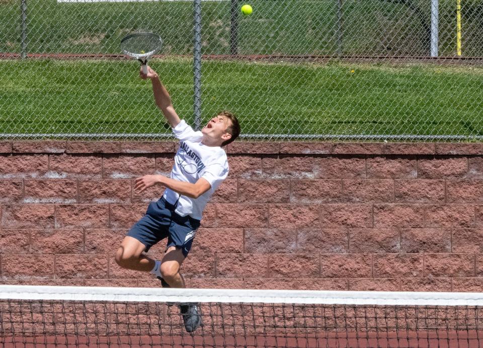 Top-seed Jonathan Arbittier of Dallastown serves to Spring Grove's James Raub in the YAIAA Class 3A singles tournament at Red Lion HS on Thursday, April 28, 2022. Arbittier was the runner-up at the District 3 3A singles tourney on Saturday.