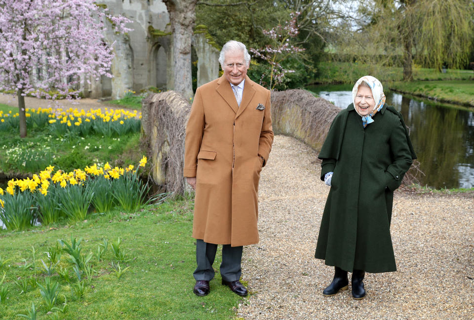 In this handout image released on April 2, 2021, Queen Elizabeth II and Prince Charles, Prince of Wales pose for a portrait in the garden of Frogmore House, on March 23, 2021 in Windsor, England. (Photo by Chris Jackson/Getty Images)