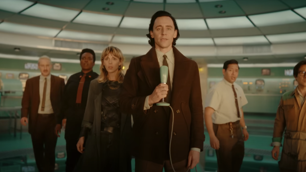 loki and the tva stand in a control room