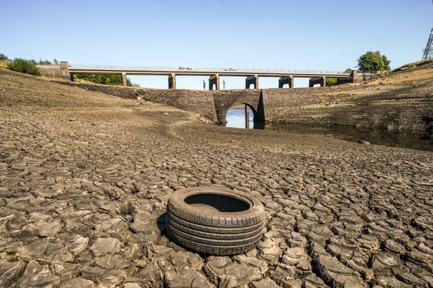 Dry cracked earth at Baitings Reservoir in Ripponden, West Yorkshire. (Photo: Danny Lawson via PA Wire/PA Images)