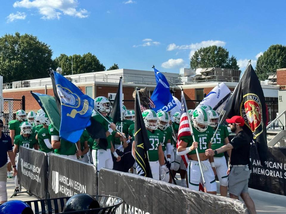 Weddington High takes the field before Thursday’s blowout win over Cox Mill at Memorial Stadium