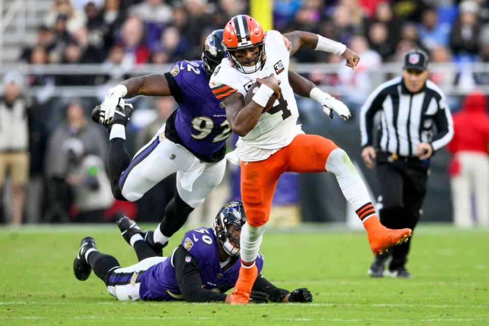 Cleveland Browns quarterback Deshaun Watson runs against the Baltimore Ravens during the second half on an NFL football game Sunday, Nov. 12, 2023, in Baltimore. (AP Photo/Nick Wass)