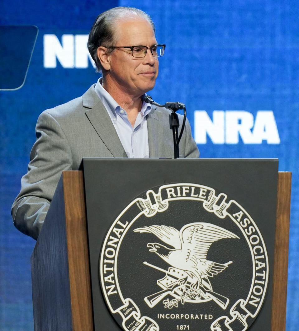 U.S. Sen. Mike Braun speaks Friday, April 14, 2023, during the NRA convention at the Indiana Convention Center in Indianapolis.