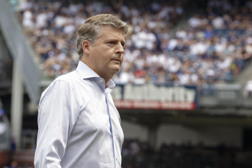 FILE - Hal Steinbrenner, chairman and managing general partner of Yankee Global Enterprises, looks on during retired New York Yankee Paul O'Neill's number retirement ceremony before a baseball game between the New York Yankees and the Toronto Blue Jays on Aug. 21, 2022, in New York. Steinbrenner plans to keep Aaron Boone as his manager. (AP Photo/Corey Sipkin, File)