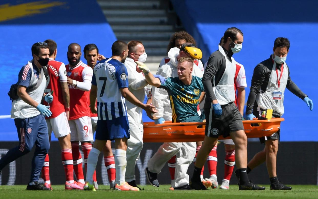 Arsenal goalkeeper Bernd Leno argues with Brighton and Hove Albion's Neal Maupay