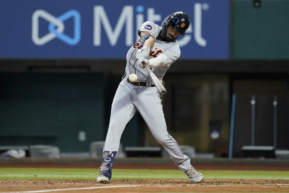 Detroit Tigers' Riley Greene connects for a single in the second inning of a baseball game against the Texas Rangers in Arlington, Texas, Sunday, Aug. 28, 2022. (AP Photo/Tony Gutierrez)