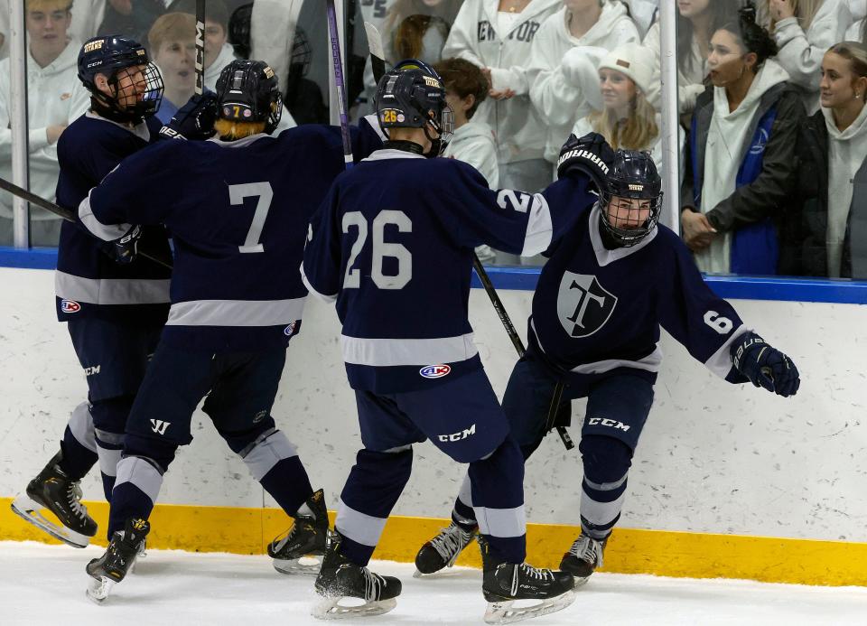 Thomas’s Cameron Hall celebrates a his goal against Schroeder.