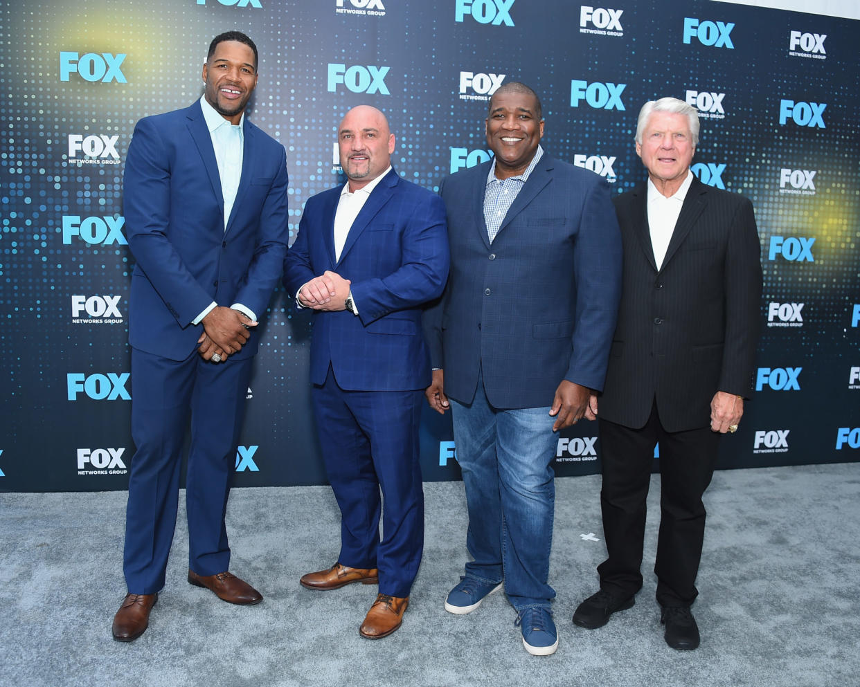 fox sports nfl analysts including Jay Glazer pose for a picture