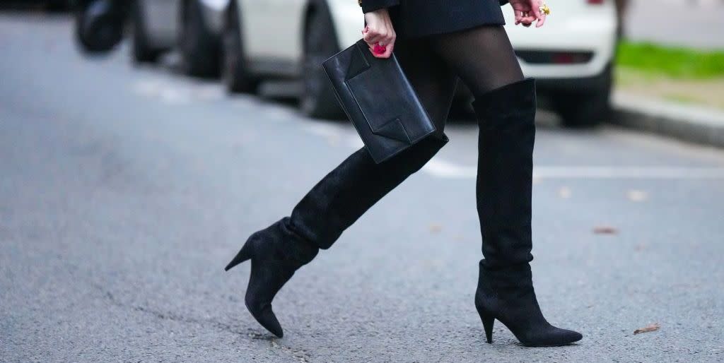 a woman wears black tights to illustrate a post about sheertex tights on sale 2022