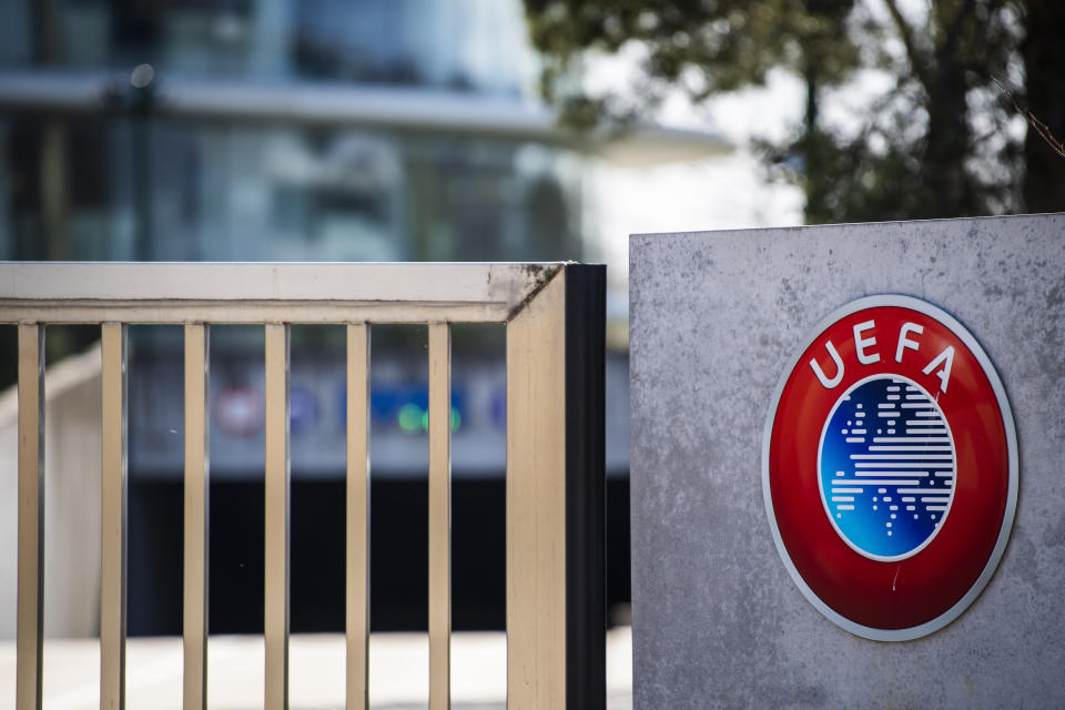 FILE - The UEFA logo displayed to the entrance of the UEFA Headquarters, in Nyon, Switzerland, Tuesday, March 17, 2020. UEFA’s decision to welcome Russian youth teams back into its competitions has cost its Swedish vice president his other top-tier job as head of a national sports body. Karl-Erik Nilsson has on Friday, Oct. 6, 2024 resigned as chairman of the Swedish Sports Confederation. (Jean-Christophe Bott/Keystone via AP)