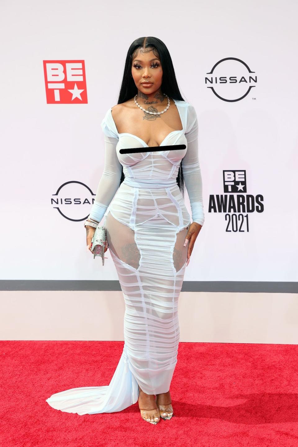 Summer Walker wears a baby-blue mesh gown at the 2021 BET Awards.