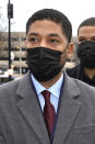Actor Jussie Smollett arrives at the Leighton Criminal Courthouse for day three of his trial in Chicago on Wednesday, Dec. 1, 2021. Smollett is accused of lying to police when he reported he was the victim of a racist, anti-gay attack in downtown Chicago nearly three years ago. (AP Photo/Charles Rex Arbogast)