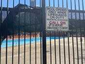 The empty pool at the Hamlin Park Pool remains closed to swimmers in Chicago, Thursday, June 16, 2022. Chicago's public pools will remain closed until July 5, 2022, according to park superintendent and CEO Rosa Escareño. The city, like the rest of the U.S., is experiencing a critical shortage of lifeguards and is offering $600 retention bonuses to attract new applicants. (AP Photo/Claire Savage)