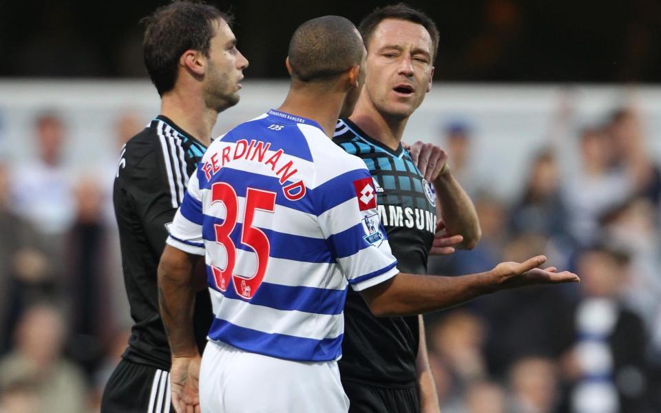 Chelsea captain John Terry (right) speaking with QPR's Anton Ferdinand  - PA