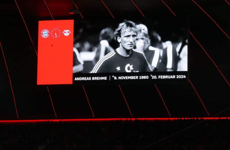 A photo of Andreas Brehme can be seen on a display board during a minute's silence during the German Bundesliga soccer match between Bayern Munich and RB Leipzig at Allianz Arena. Sven Hoppe/dpa