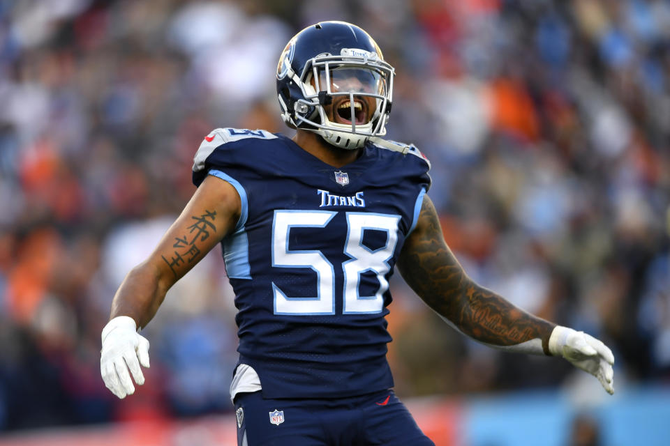 Tennessee Titans outside linebacker Harold Landry (58) celebrates a sack of Cincinnati Bengals quarterback Joe Burrow during the first half of an NFL divisional round playoff football game, Saturday, Jan. 22, 2022, in Nashville, Tenn. (AP Photo/John Amis)