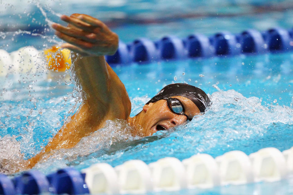 INDIANAPOLIS, IN - MARCH 29: Michael Klueh swims in the men's 400 meter freestyle finals during day one of the 2012 Indianapolis Grand Prix at the Indiana University Natatorium on March 29, 2012 in Indianapolis, Indiana. (Photo by Dilip Vishwanat/Getty Images)