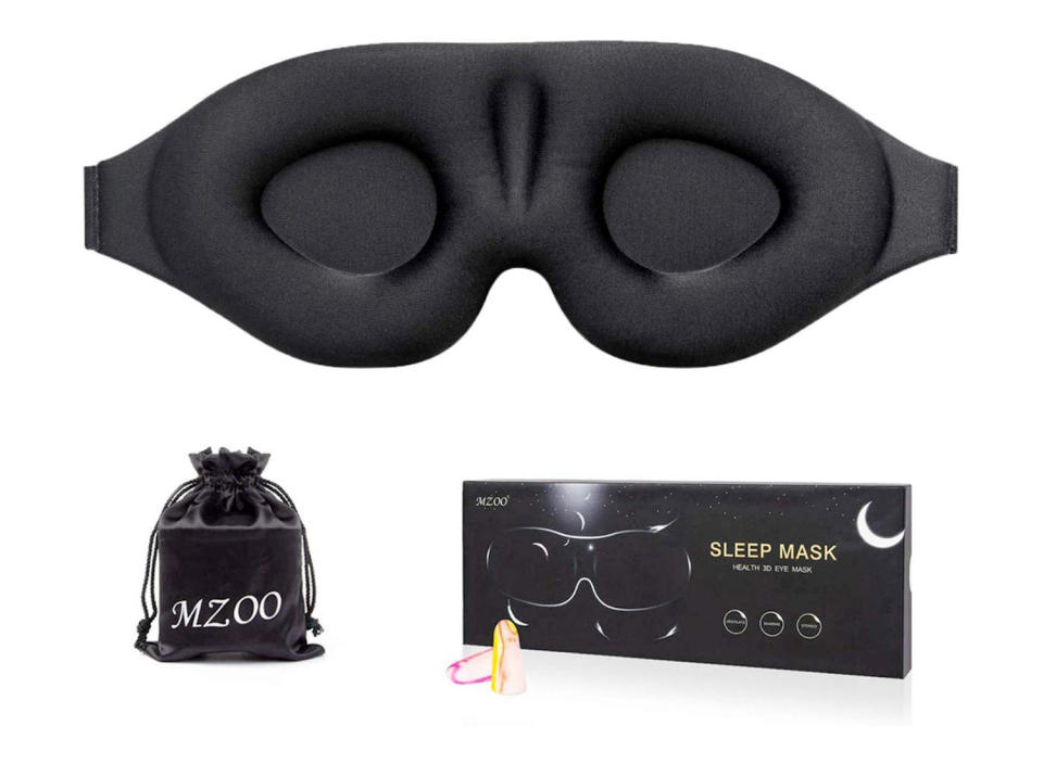 A light-blocking sleep mask will help you get your full eight hours. (Source: Amazon)