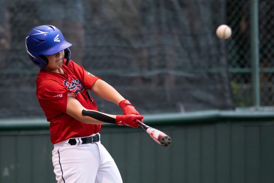 Rutland's Logan Tessier smacks an RBI single in the second inning versus Holden in the District 4 championship at Joe Schwartz Field in Worcester on Wednesday July 12, 2023.