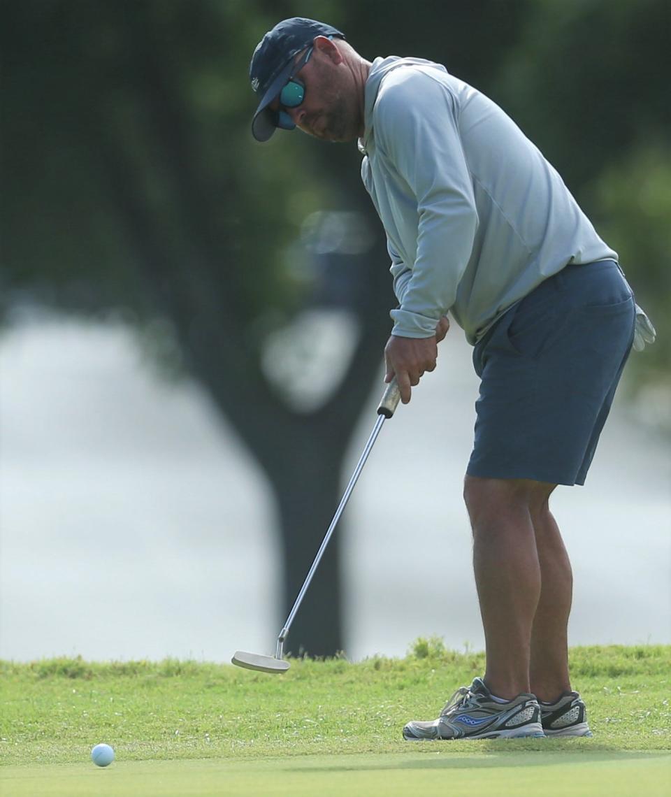 Jason Ball rolls a putt on the 10th hole during the second round of the Bentwood Country Club Men's Partnership on Saturday, July 23, 2022.