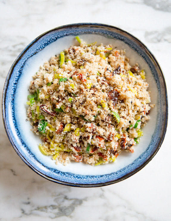 Cauliflower "Couscous" With Leeks and Sundried Tomatoes on a plate