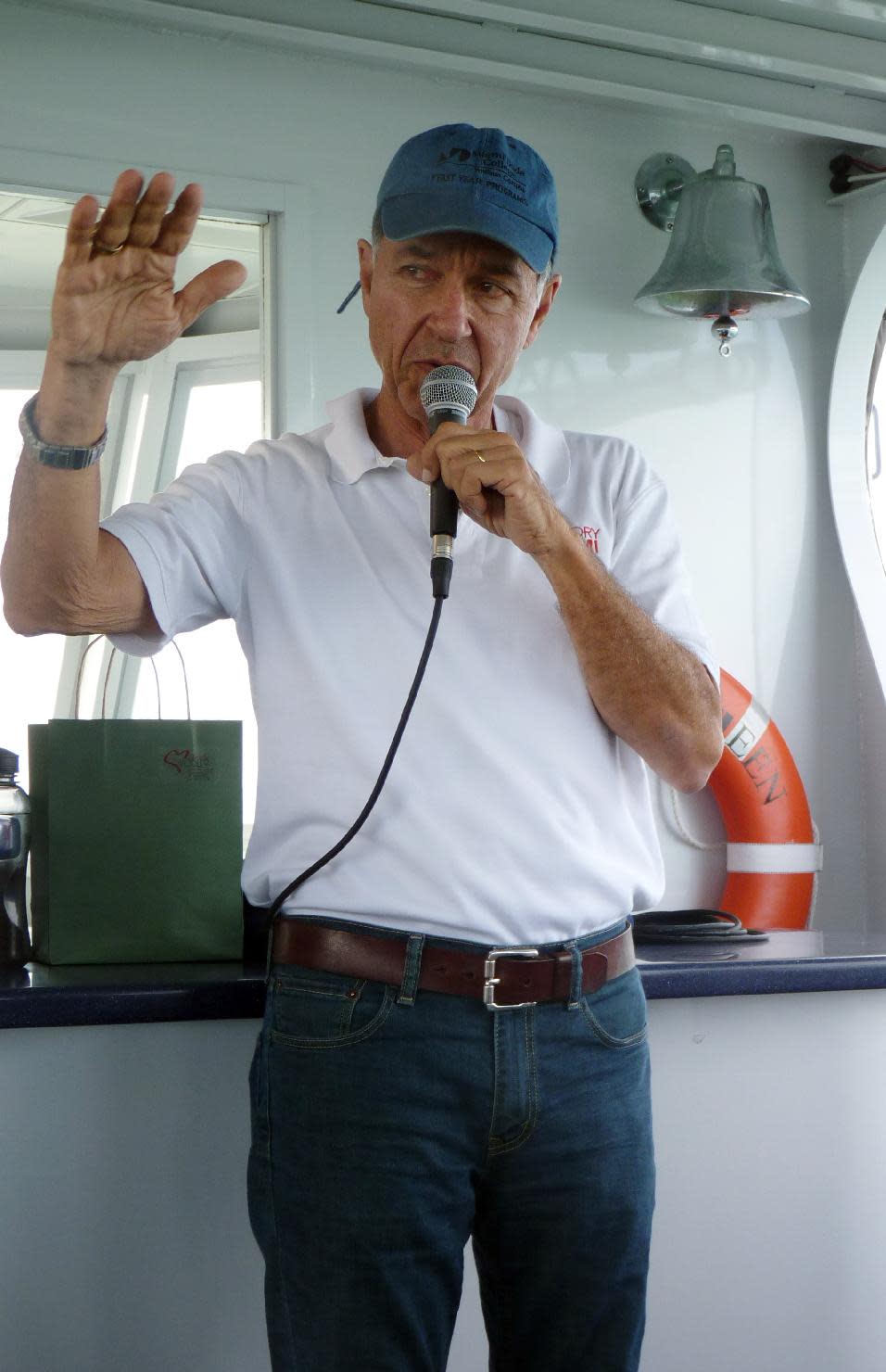 In this photo taken Sunday, Nov. 11, 2012, historian Paul George narrates the story of Stiltsville, a group of homes in Biscayne National Park. The narrated tour tells the colorful story of these homes perched above the shallow waters of Biscayne Bay. (AP Photo/Suzette Laboy)