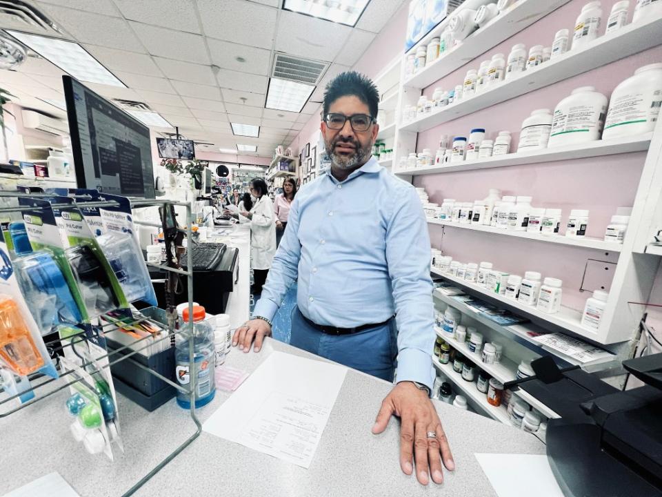 Milton Reyes, manager of Mi Farmacia in Jackson Heights, says shoplifters ransack the store and sell the goods on the sidewalk outside. Matthew McDermott