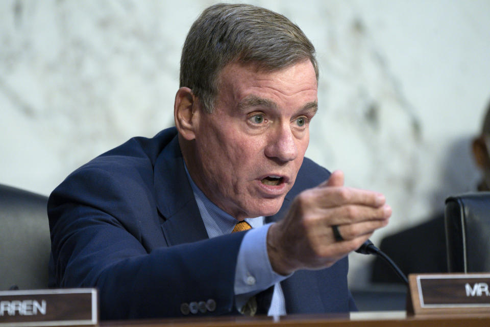 Sen. Mark Warner, D-Va., questions the panel during a Senate Banking Committee annual Wall Street oversight hearing, Thursday, Sept. 22, 2022, on Capitol Hill in Washington. (AP Photo/Jacquelyn Martin)