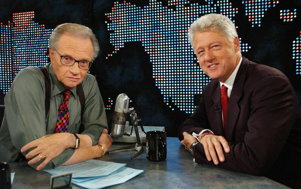 Former President Bill Clinton (R) speaks with Larry King on CNN in New  York on September 3, 2002, about the Families of Freedom Scholarship  Fund. Clinton and former Senator Bob Dole have raised over $100 million  to fund college scholarships for dependent children who lost a parent  in the attacks on September 11. REUTERS/Chip East    CME