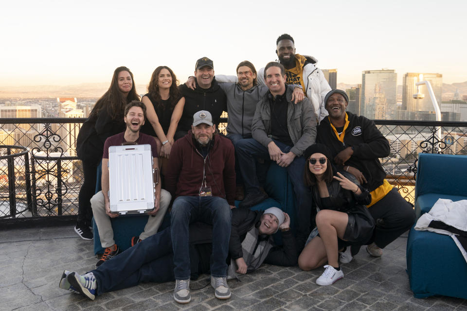 (L to R) Shelley Hennig as Ava Winters, Executive Producer Jon Hurwitz, Nick Zano as Chad McKnight, Executive Producer Hayden Schlossberg, Terrence Terrell as Trunk, Co-Executive Producer Joe Piarulli, Co-Executive Producer Bob Dearden, Executive Producer/Director Josh Heald, Kimi Rutledge as Maya Lerner in Obliterated. (Ursula Coyote/Netflix)