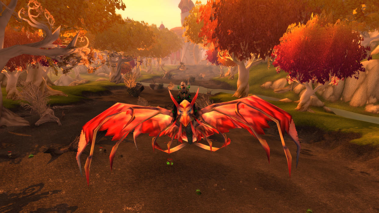  World of Warcraft - a blood elf rides a flight path through Eversong Woods. 