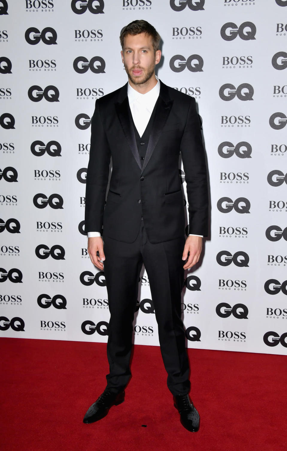 Calvin Harris went sans tie, but made sure he still looked smart in a three piece suit. 