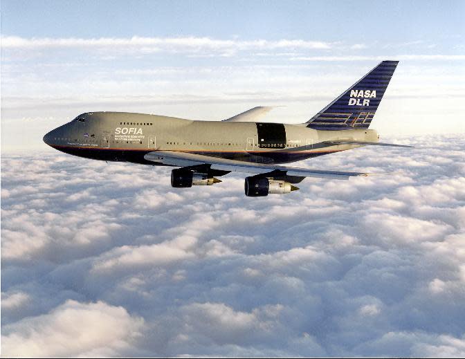 In this 1998 photo provided by NASA and Universities Space Research Association (USRA) shows a modified Boeing 747SP jetliner containing the Stratospheric Observatory for Infrared Astronomy (SOFIA) infrared observatory, a project of NASA and the German Aerospace Center. The White House released its budget on Tuesday, March 4, 2014, that proposes to mothball the observatory unless Germany and other partners can kick in more money. (AP Photo/NASA/USRA)