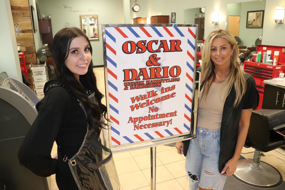 Stylists Megan Ubaldi and Nella Caputo pose for a photo at Oscar and Dario Unisex Hairstyling and Barbering on June 8. The pair, alongside co-worker Lori Pavoni, will be relocating to Ezio's Barber Shop on Great Northern Road after this Station Mall mainstay shuts down on June 22.